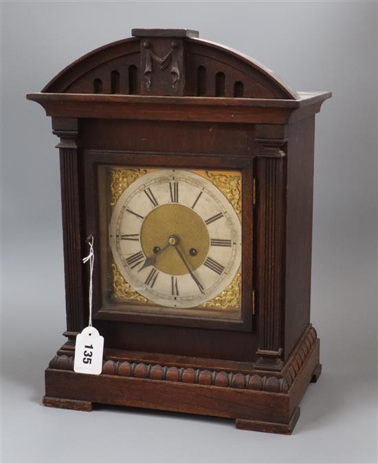 An oak mantel clock